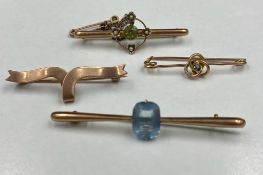 A selection of four 9ct gold brooches in various styles. (Approximate Total Weight 7.8g)