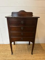 A Mid Century four drawer music cabinet with galleried top (H92cm W50cm D36cm)