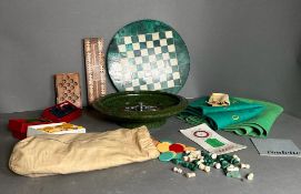 A selection of games and gaming tokens to include chess board and pieces, cribbage board and a