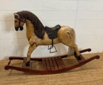 A vintage wooden painted child's rocking horse (H76cm)