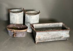 A selection of galvanised pots and planters