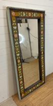 A reclaimed wooden full length wall mirror with painted floral boarder 91cm x 194cm