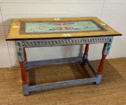 A reclaimed pine painted table with floral detail (H70cm W105cm D56cm)