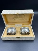 A boxed pair of Italian silver napkin rings