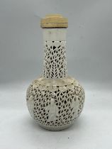 A Chinese porcelain vase, pierced decoration of elders (H27cm)