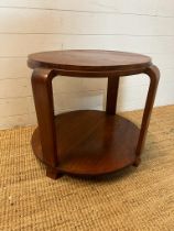 An wooden Art Deco circular side table comprising of four Bentwood supports and shelf under (H52cm