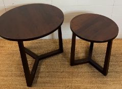 A nesting pair of circular tables made in Italy by Flexform