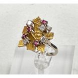 An 18ct gold set diamond and ruby ring, size N1/2