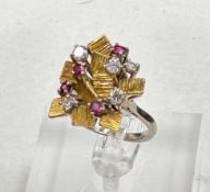 An 18ct gold set diamond and ruby ring, size N1/2