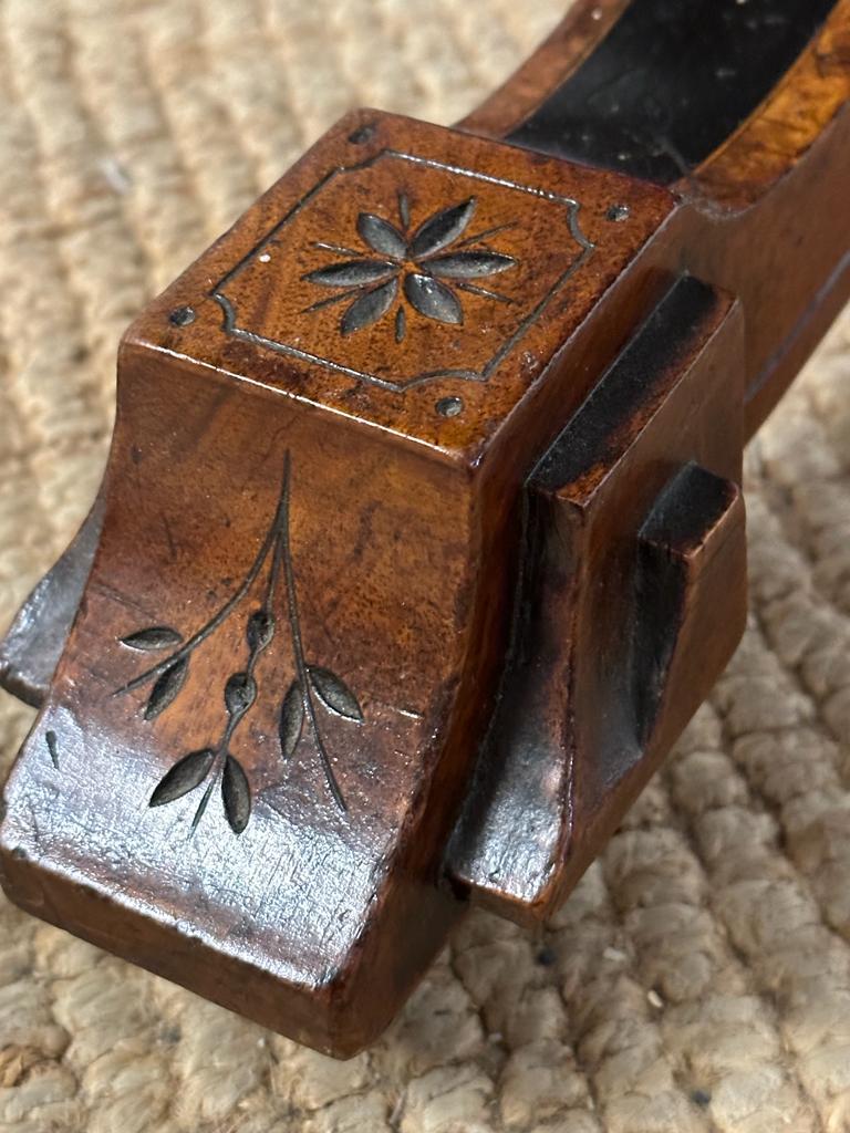 An oval walnut centre table with ebonised inlay and pierced floral detail, on four splayed legs with - Image 5 of 9