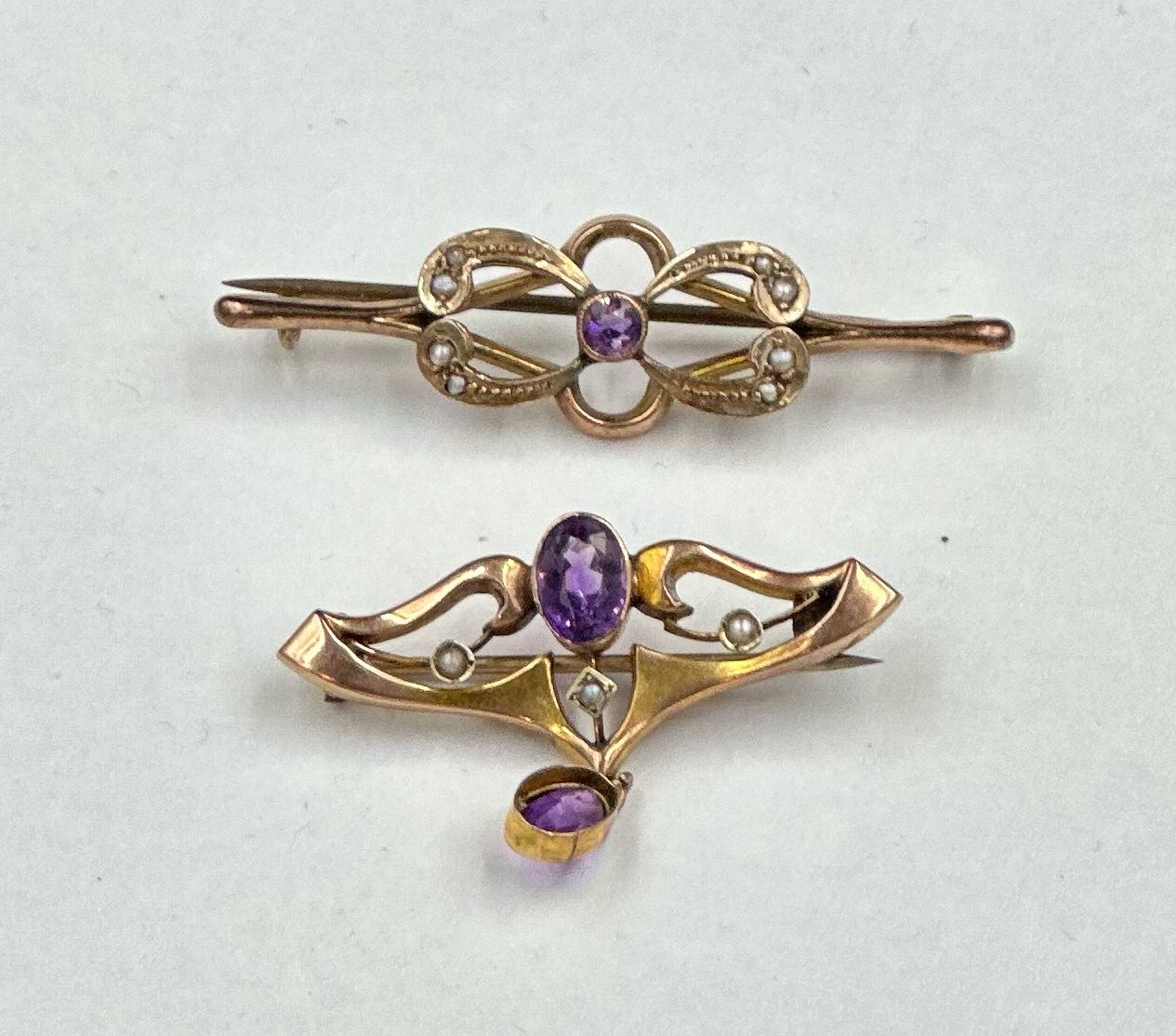 Two 9ct gold brooches, featuring purple stones and diamond decoration - Image 2 of 2