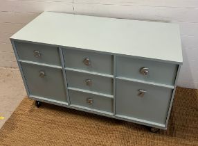 A side cabinet chest of drawers with the drawer handles in the form of numbers (H76cm W123cm D53cm)