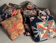 A selection of rustic Persian style rug pillows