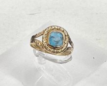 An untested gold ring with central turquoise stone, approximate size I1/2