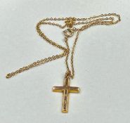 A 9ct gold cross on fine necklace, approximate total weight 2g