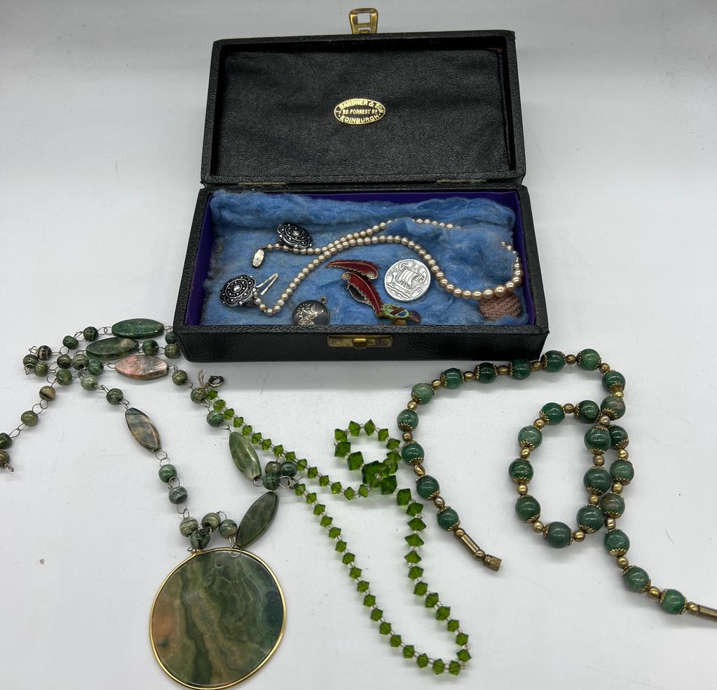 A selection of mixed costume jewellery to include Articulated necklaces, enamel earrings and a set