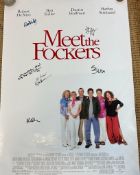 A film poster for the film “Meert The Fockers” signed by cast members including Barbra Streisand,