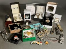 A selection of costume jewellery and watches