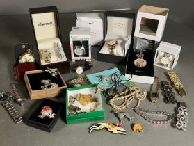 A selection of costume jewellery and watches