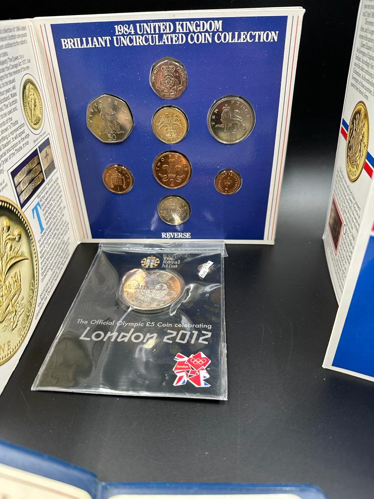 Four coin presentation packs to include 1983 United Kingdom Uncirculated £1 coin, Britain's First - Image 3 of 4