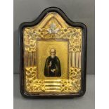 A Russian icon in a glazed case 27cm x 36cm