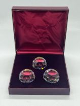 Three Swarovski crystal paper weights, boxed