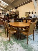 A G-Plan teak extendable dining table and six chairs