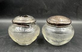 Two silver topped dressing table jars AF