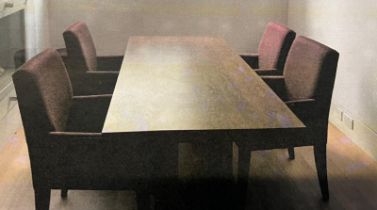 A Promemoria Italy dining table with four Promemoria chairs