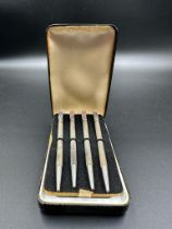 A boxed set of sterling silver bridge pencils