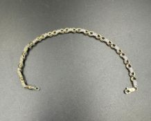 A 14ct gold and diamond bracelet (18.5cm L and approximately 5.2g)