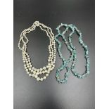 A pearl three strand necklace and a semi precious stone necklace Being sold on behalf of