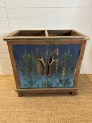 A pine painted cupboard with horn handles and floral motif (top missing) (H81cm W85cm D55cm)