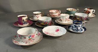 A selection of coffee and tea cups and saucers various makers