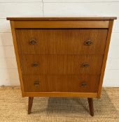 A mid century three drawer chest of drawers on splayed legs. Height 75 44x60