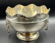 A scalloped edged punch bowl with lion handles, approximate weight 1110g, by William Hutton & Sons