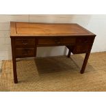 Hardwood desk with one long drawer to centre and two short each side (H76cm W124cm D60cm)