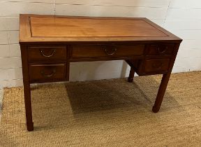 Hardwood desk with one long drawer to centre and two short each side (H76cm W124cm D60cm)