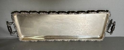 A substantial two handled silver tray with ornate decoration to side by Elkington and hallmarked for