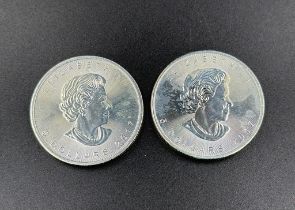 Two 2107 1oz Canad Maple leaf silver coins