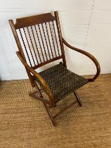 A spindle folding chair