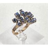 A 14ct gold and blue stone cocktail ring, size P