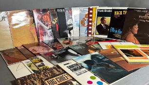A selection of vinyl LPs to include Streisand and Kristofferson, little shop of horrors and