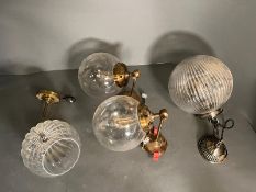 Four globe style, wall hanging lights and ceiling lights