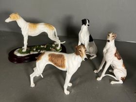 Four grey hound ornaments