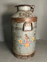 A Galvanised metal milk churn