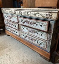 A painted six drawer sideboard with floral motif, two drawers below and two dummy drawers to top (