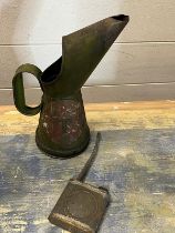 A vintage oil jug and a vintage oil can