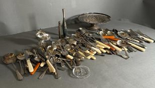 A volume of silverplated items along with flatware etc.