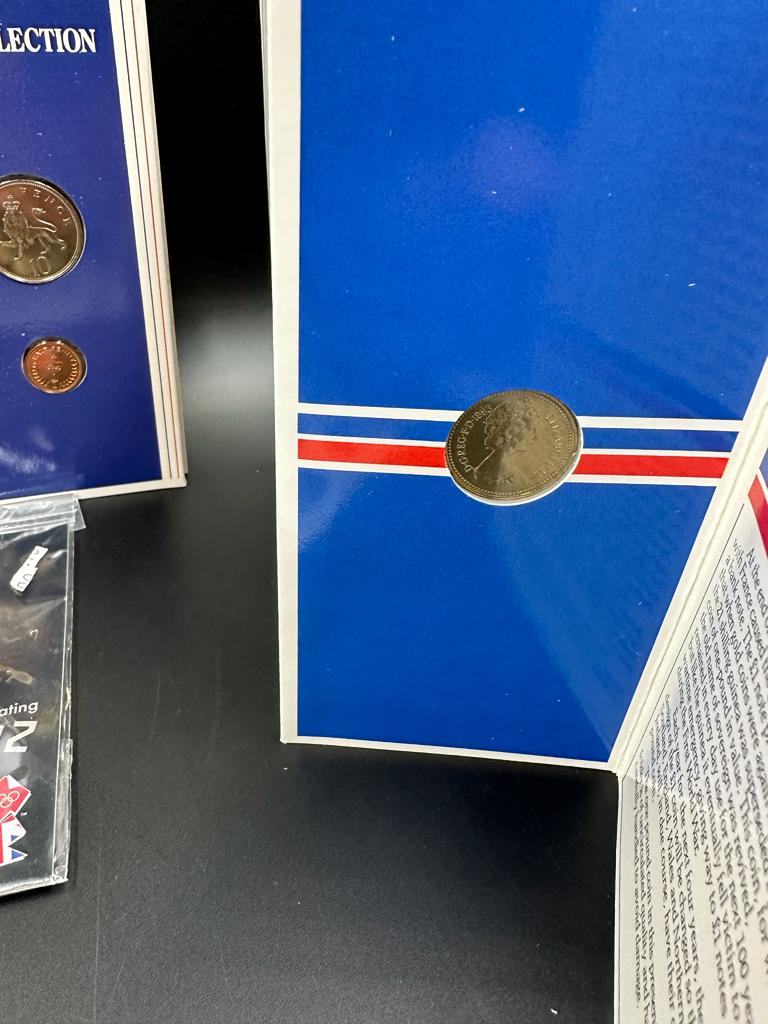 Four coin presentation packs to include 1983 United Kingdom Uncirculated £1 coin, Britain's First - Image 2 of 4